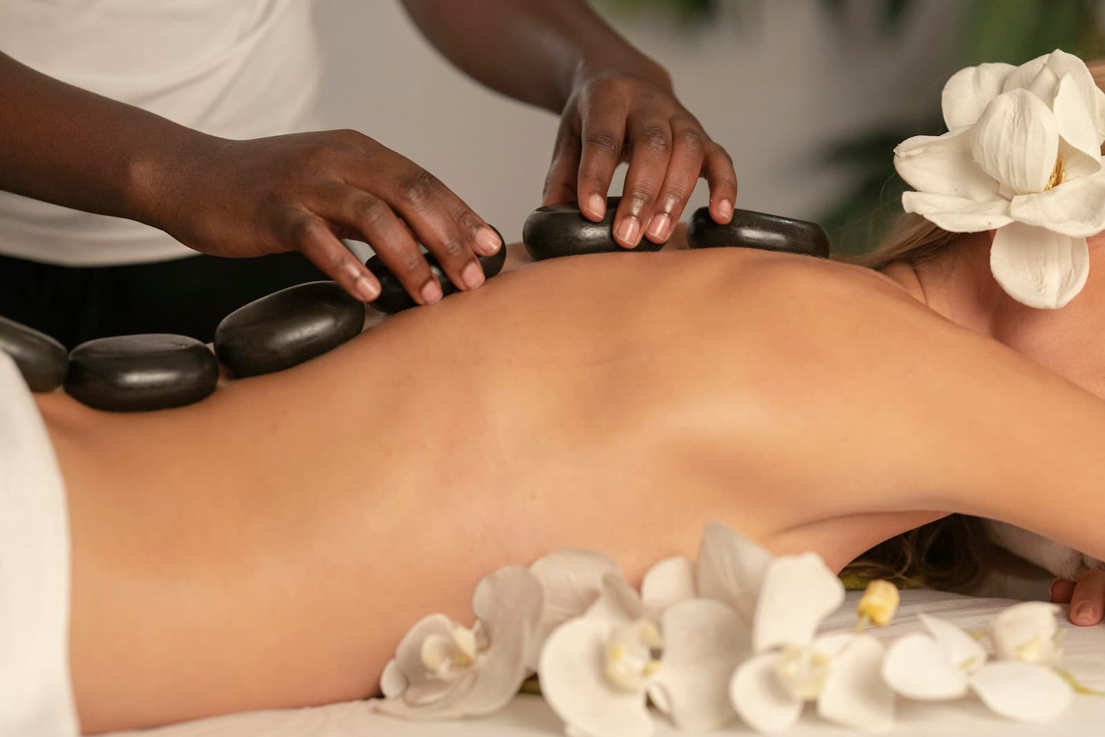 Hot stone treatment with orchids